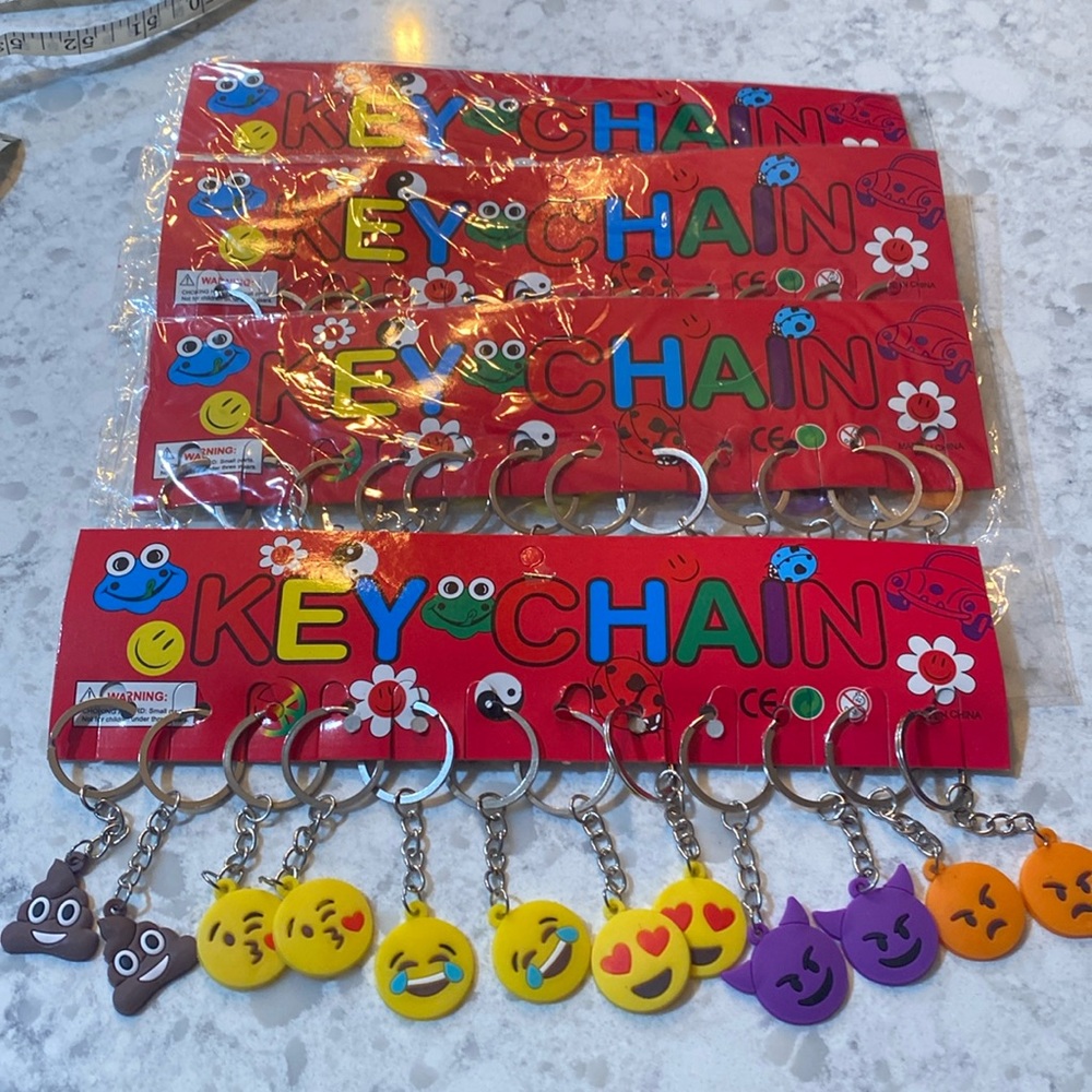 Emoji keychains (lot of 4) total of 48